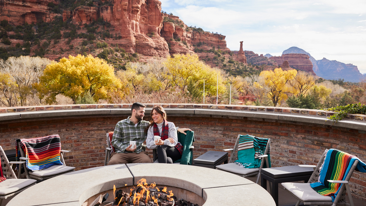 two guests enjoying firepit during cozy season